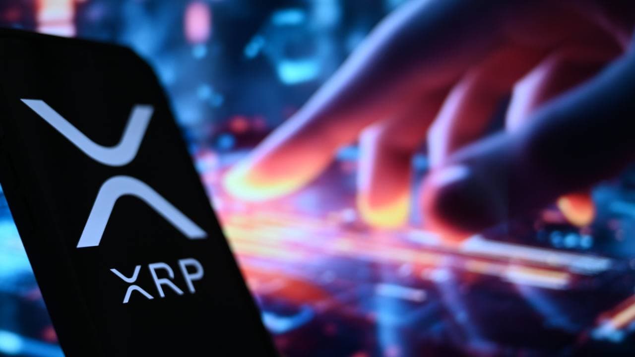 XRP Flashes ‘Intense Capitulation’ Signal as Holders Take Losses 1
